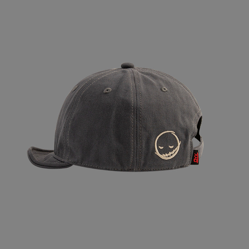Men's and women's style Embroidered solid color Simple smile face short adjustable brim