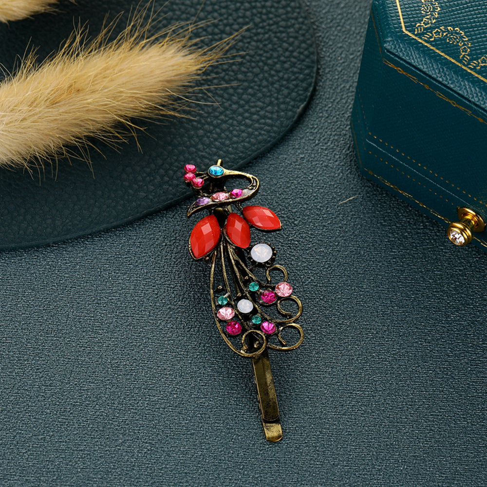 Clip à cheveux vintage en strass couleur paon
