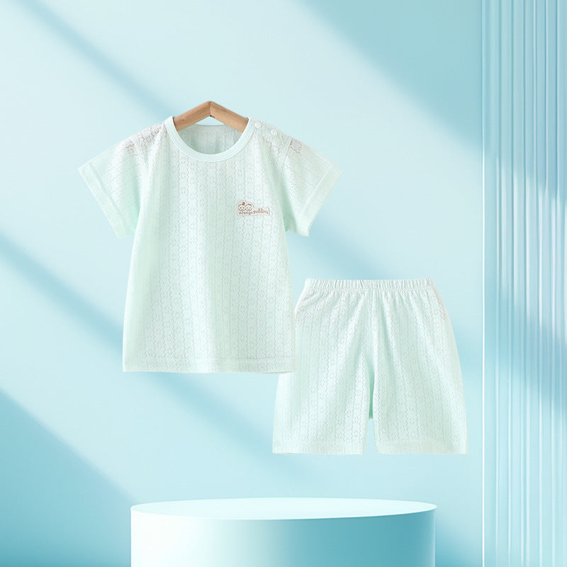Le top et le short pour enfants deux-pièces d'été