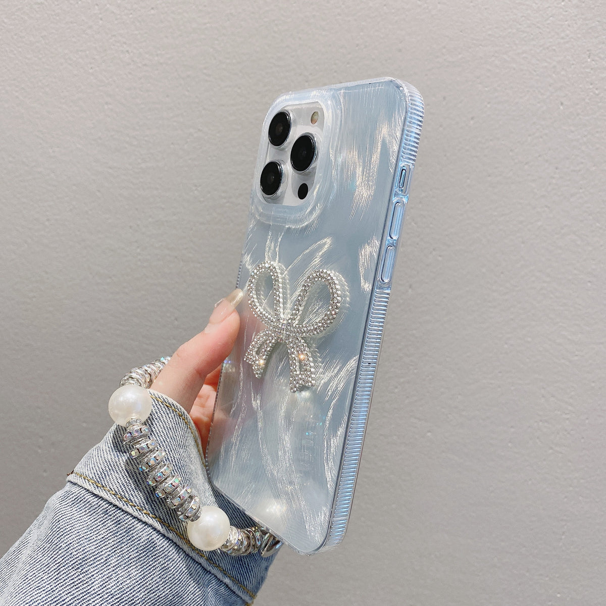 Cas de téléphone à chaîne en fils de plumes de luxe Bow