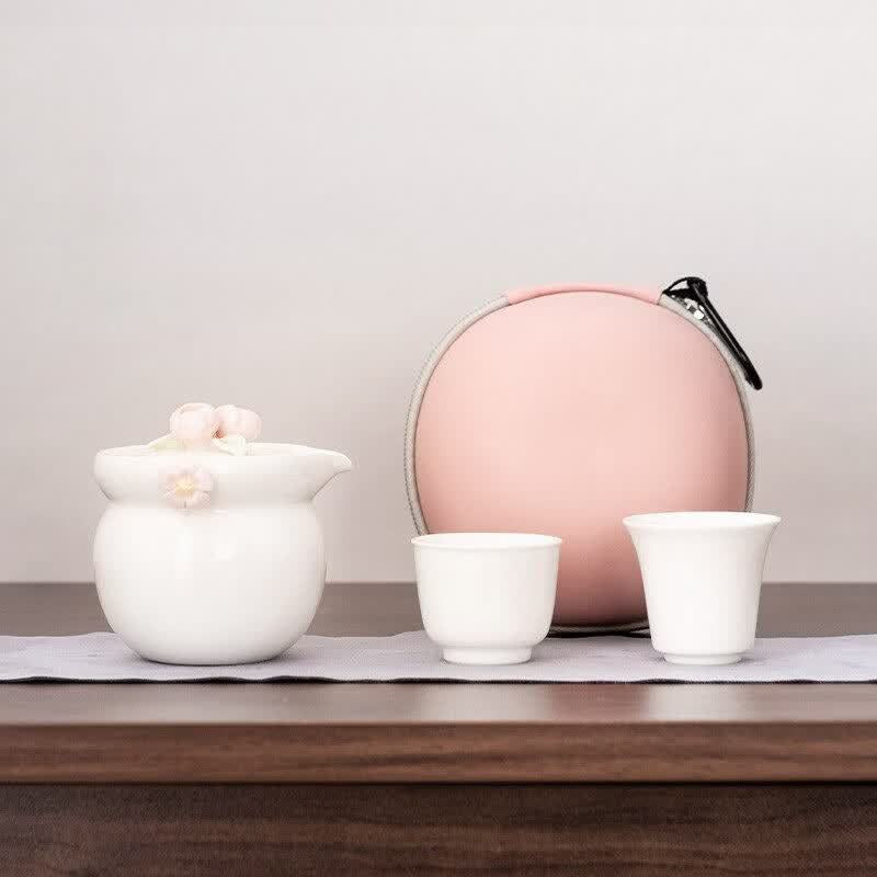 Set à thé portable en céramique fleurie à la main avec une théière et deux tasses