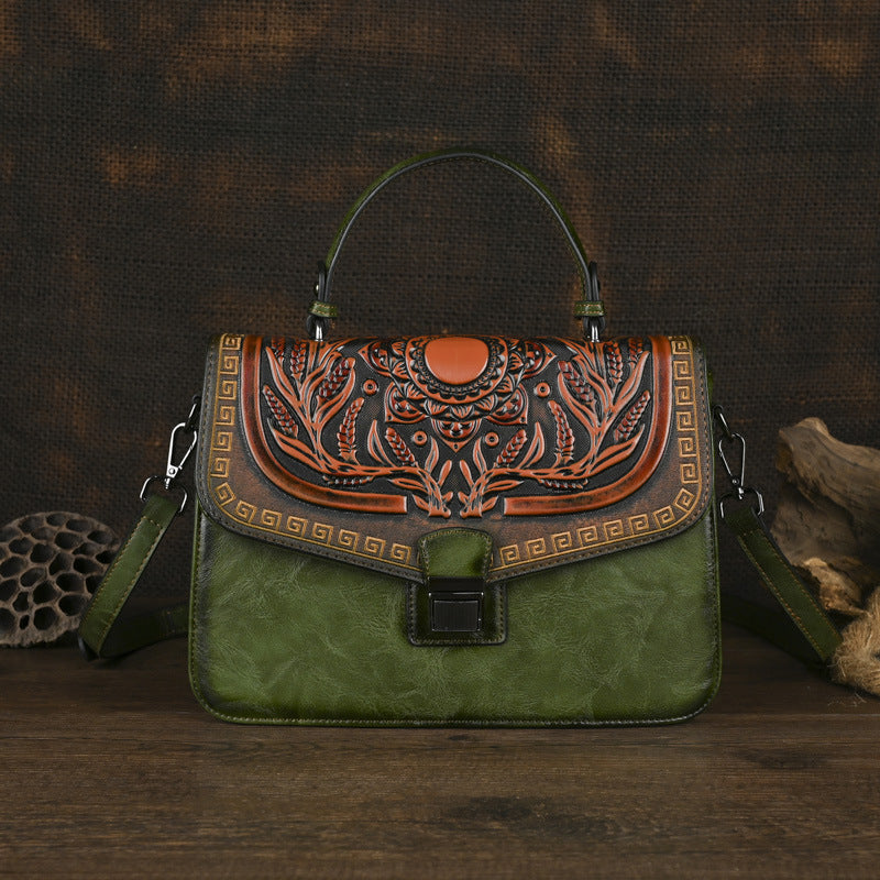 Sac à main artisanal avec une bande transversale et un design de bloc de couleur