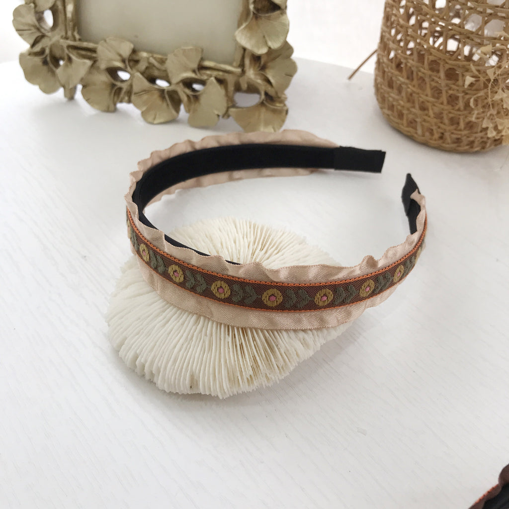 Exaggerated Black Wood Ear Hoop Hairstyle