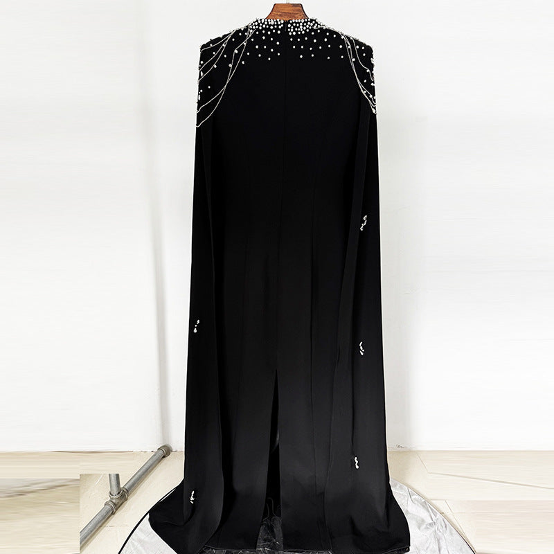 Manches de châle perlé et robe longue