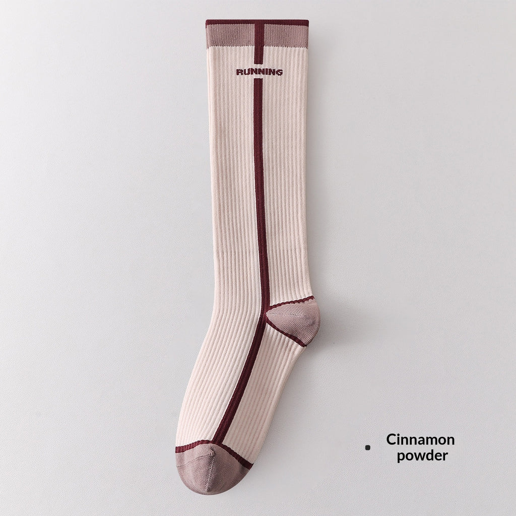 Chaussettes de calf à compression progressive pour femmes avec bandes de blocs de couleur