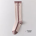 Chaussettes de calf à compression progressive pour femmes avec bandes de blocs de couleur