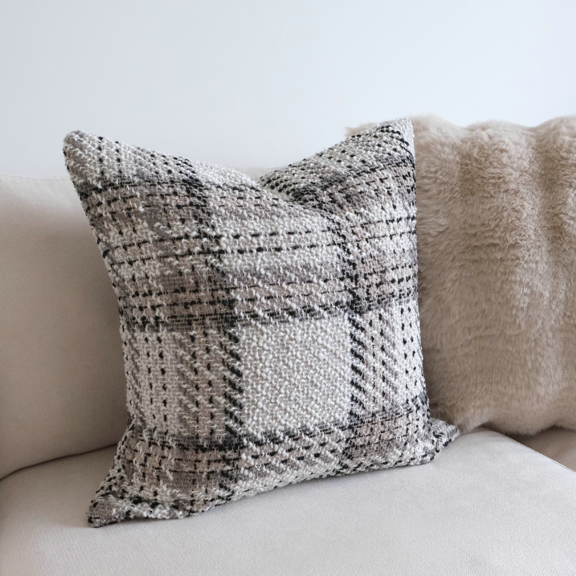 Coussin de plie à rayures enroulées
