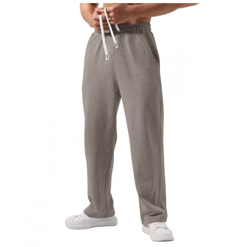 Sweatpants à cordons élastiques de couleur solide mâle
