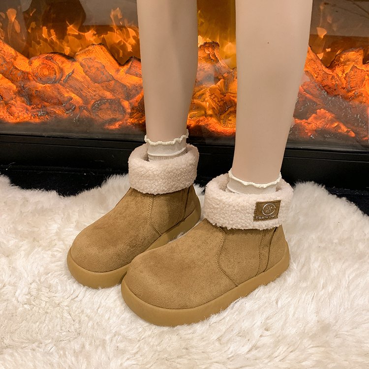 Bottes de laine d'agneau et de peluche rétro