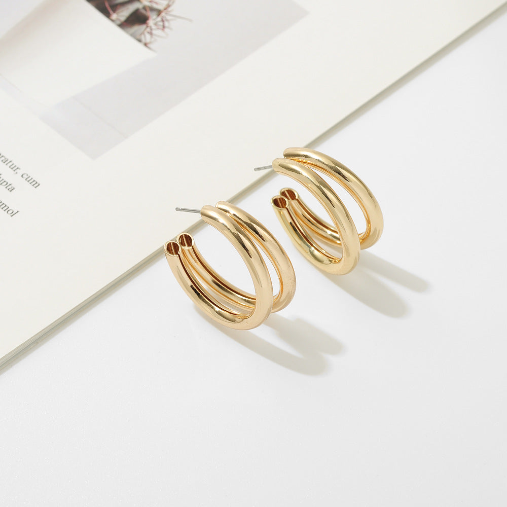 Boucles d'oreilles simples en métal double en forme de C