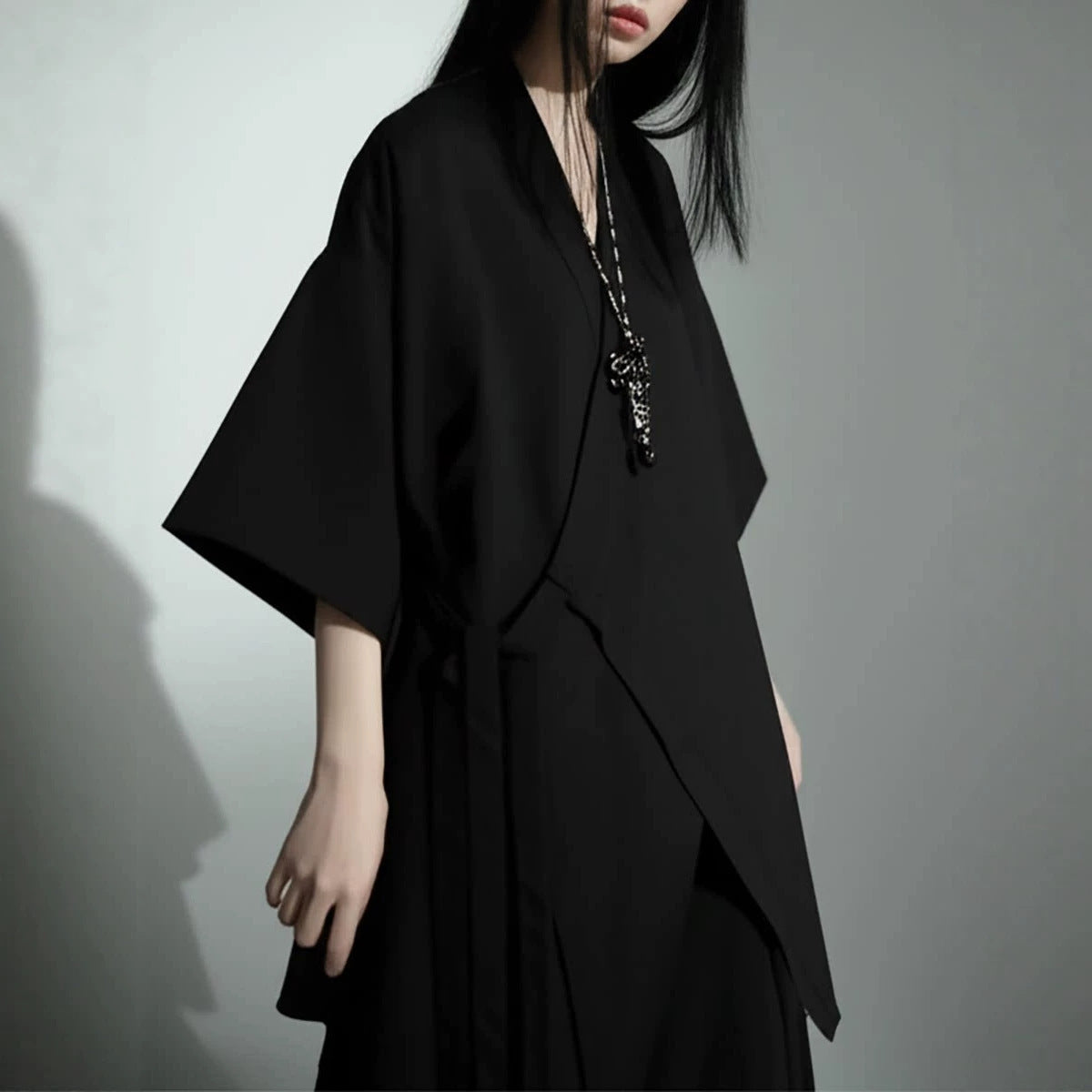 Manteau à ceinture de style neutre
