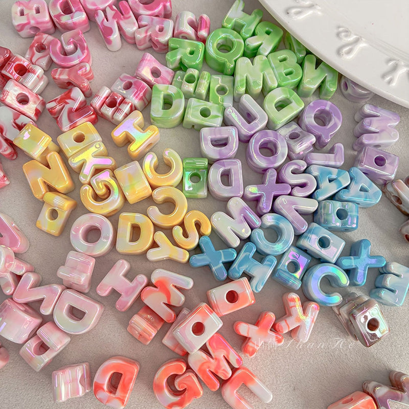 Perles à lettres acryliques plaquées UV