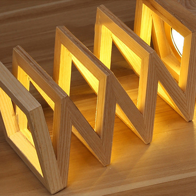 Lampe de table en bois massif créatif