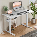 Table ergonomique réglable en hauteur avec support métallique en T