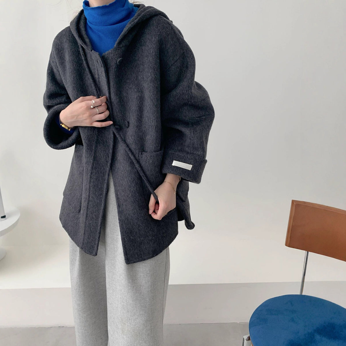 Manteau en laine à capuche alpaga