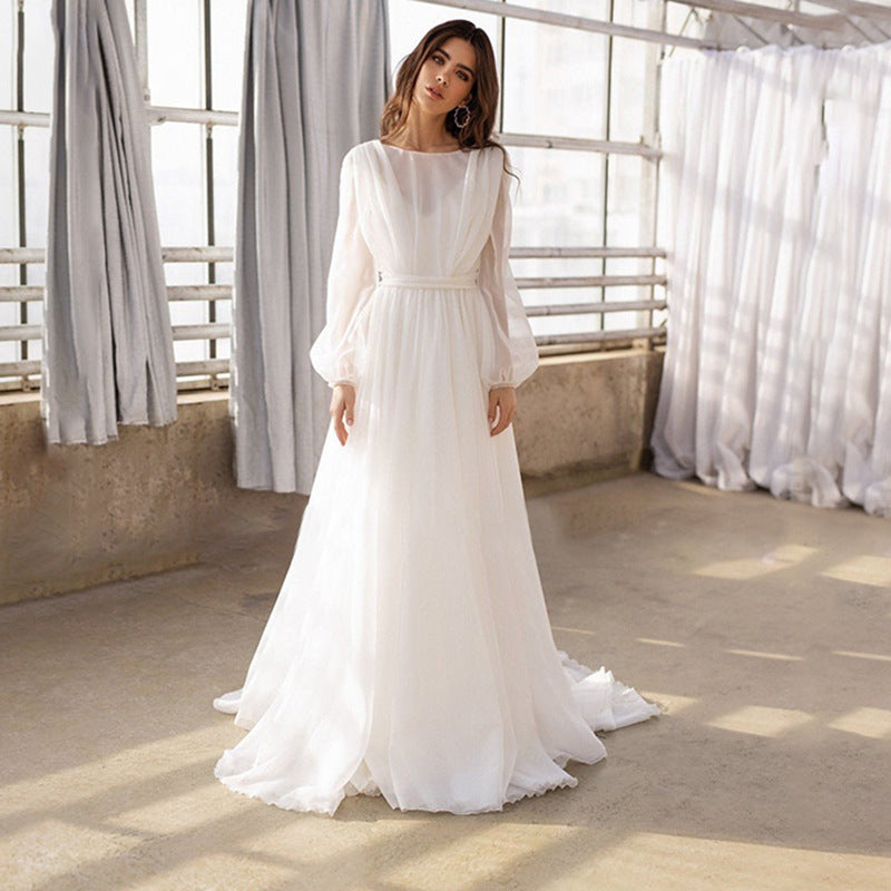 Robe de mariée à manches longues de style français avec une taille ajustée