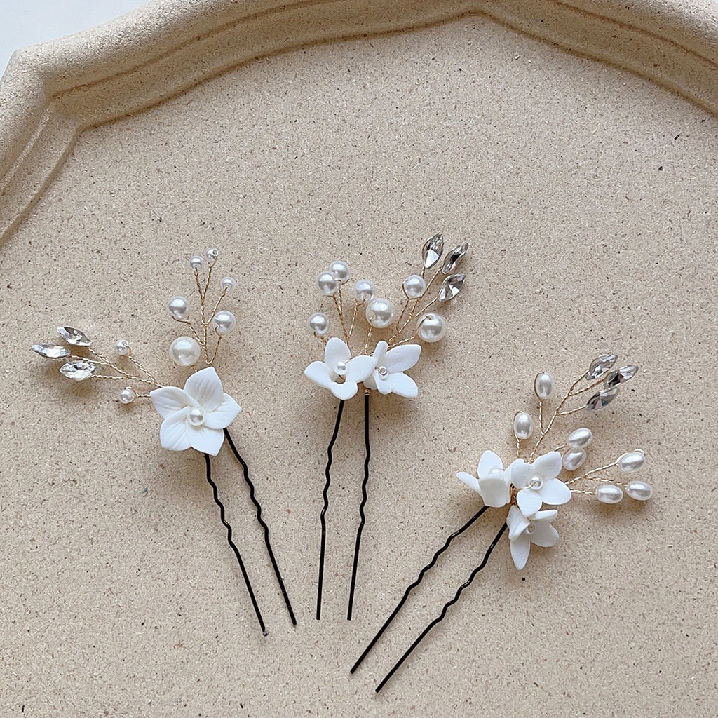 Three sets of U-shaped white flower hairpins