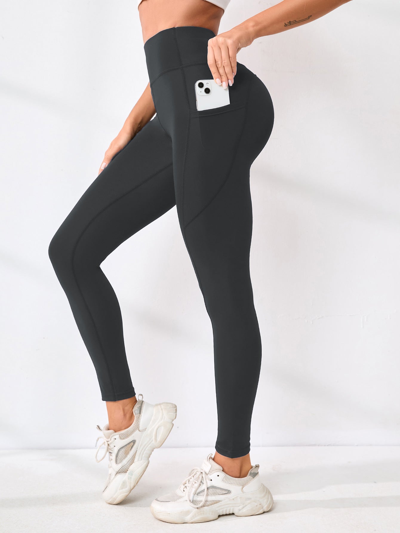 Pantalon de yoga européen et américain Couleur solide Splicing Hip-Lifting Pocket Outd