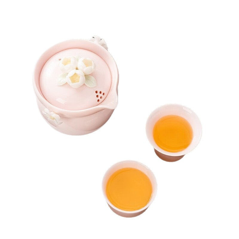 Set à thé portable en céramique fleurie à la main avec une théière et deux tasses