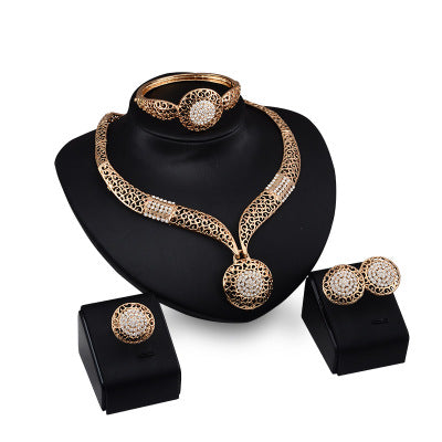 Collier boucles d'oreilles bague bijoux ensemble quatre pièces