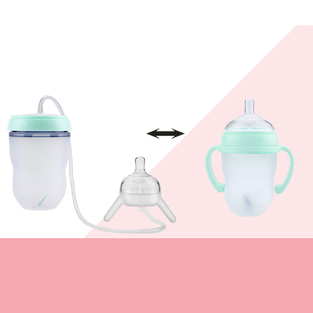 Bouteille de bébé en paille longue séparée comme du lait