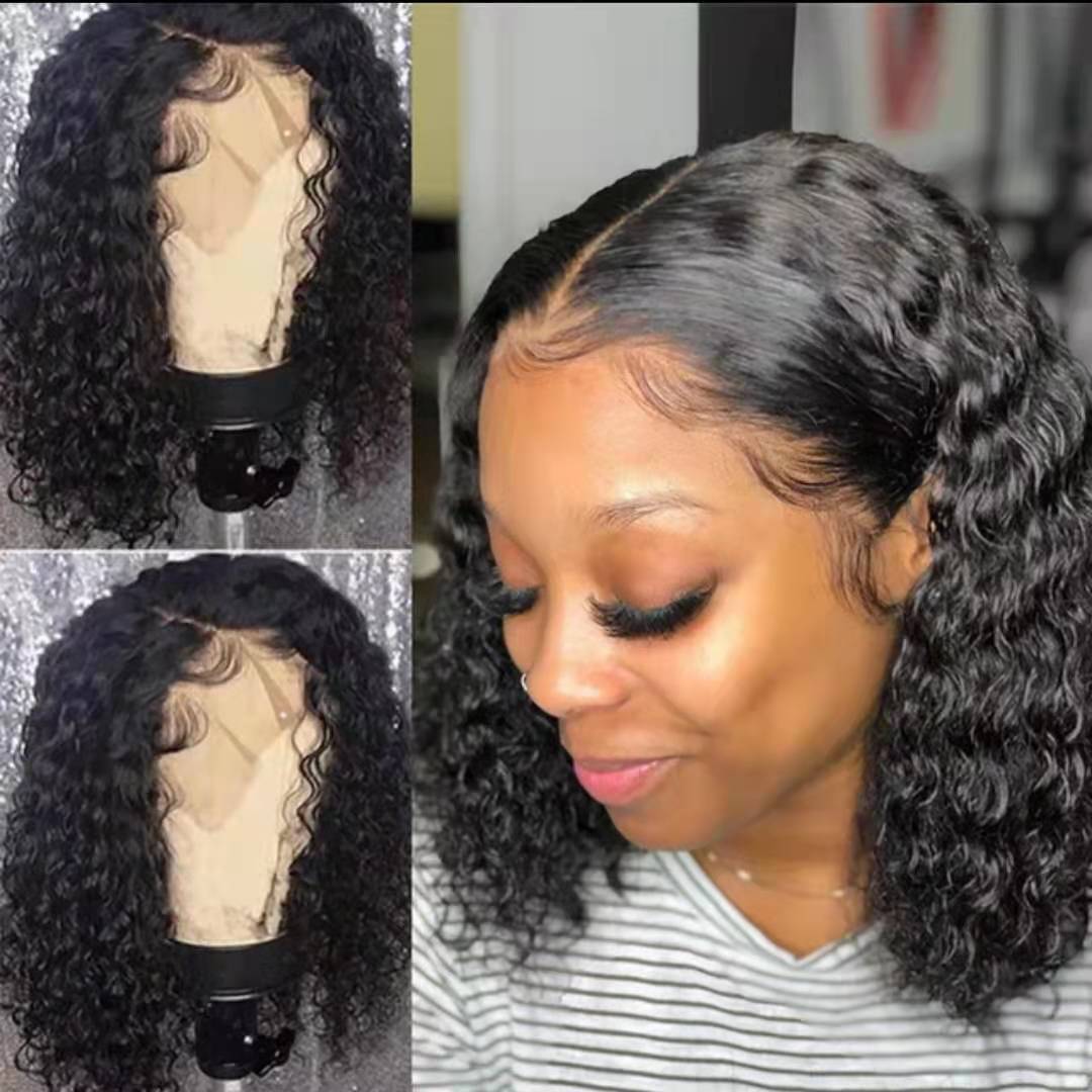 Les cheveux bouclés courts africains des femmes