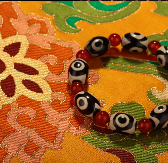 Bracelet à trois yeux Dzi Perles Agate Rouge Bracelet