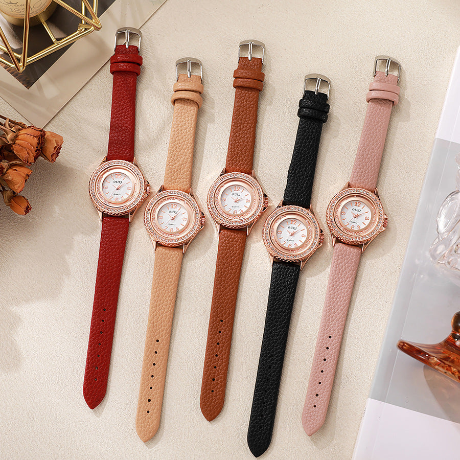 Élégante et minimaliste montre féminine ronde en strass
