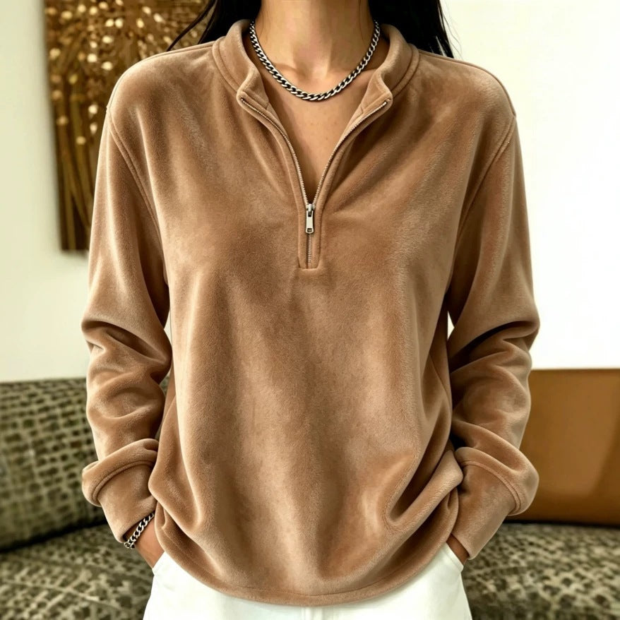 Top à manches longues de couleur unie avec un collier et une fermeture éclair
