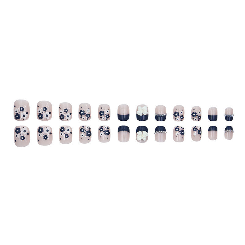 Grand Bow Strass Deep Sea Blue Nail Art pour un look plat et doux