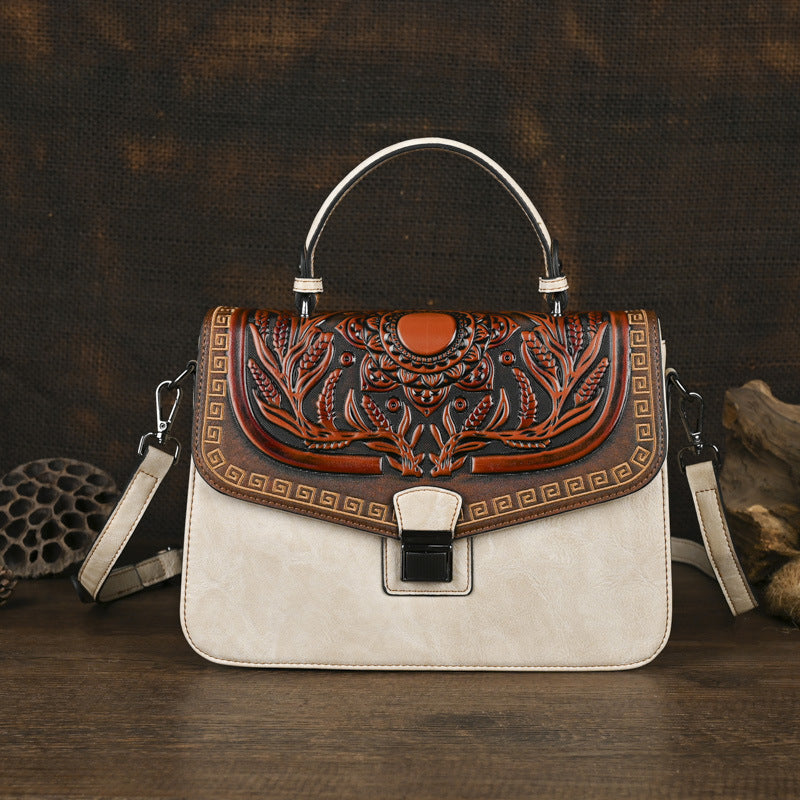 Sac à main artisanal avec une bande transversale et un design de bloc de couleur
