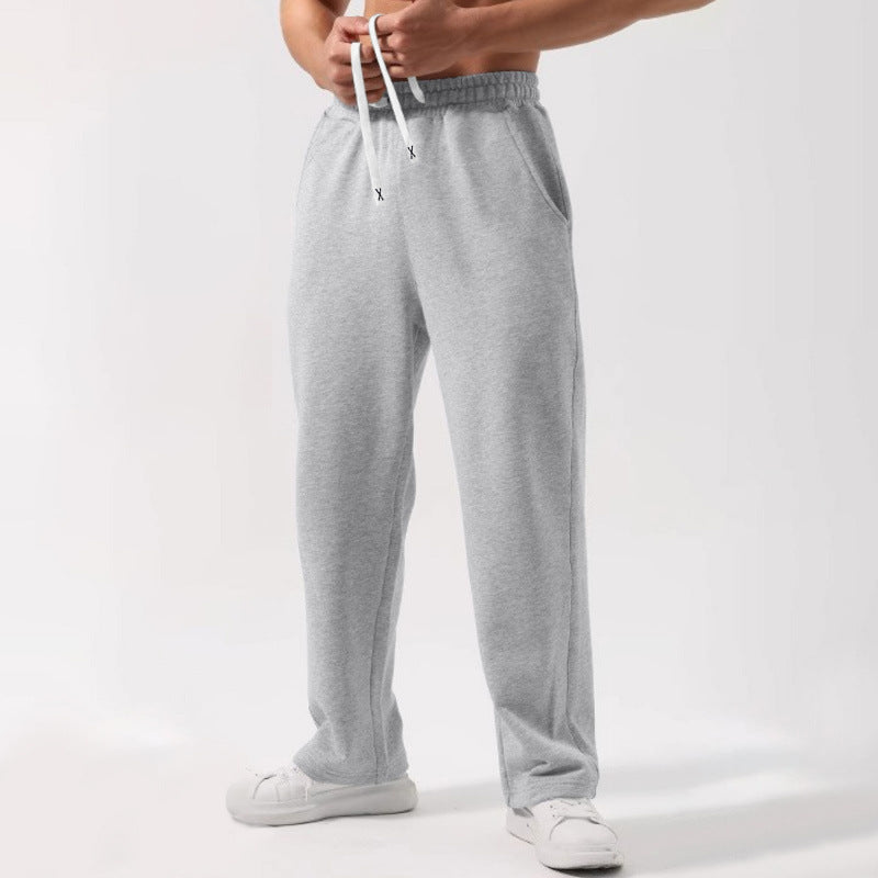 Sweatpants à cordons élastiques de couleur solide mâle