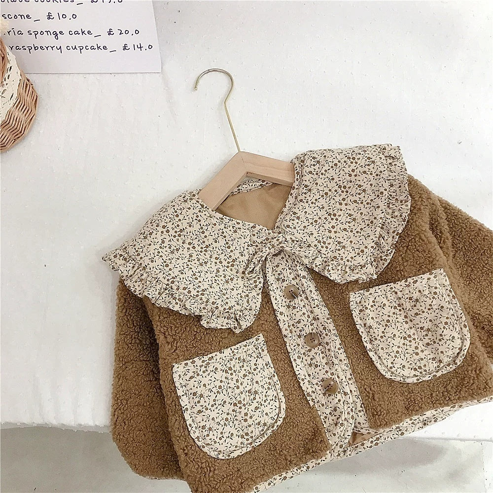 Manteau de fourrure à col de poupée avec doublure en polaire