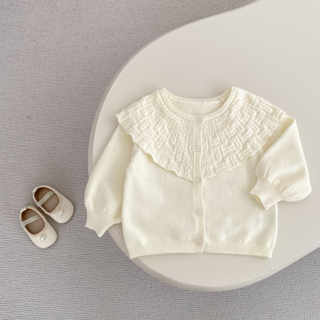 Manteau tricoté pour bébé