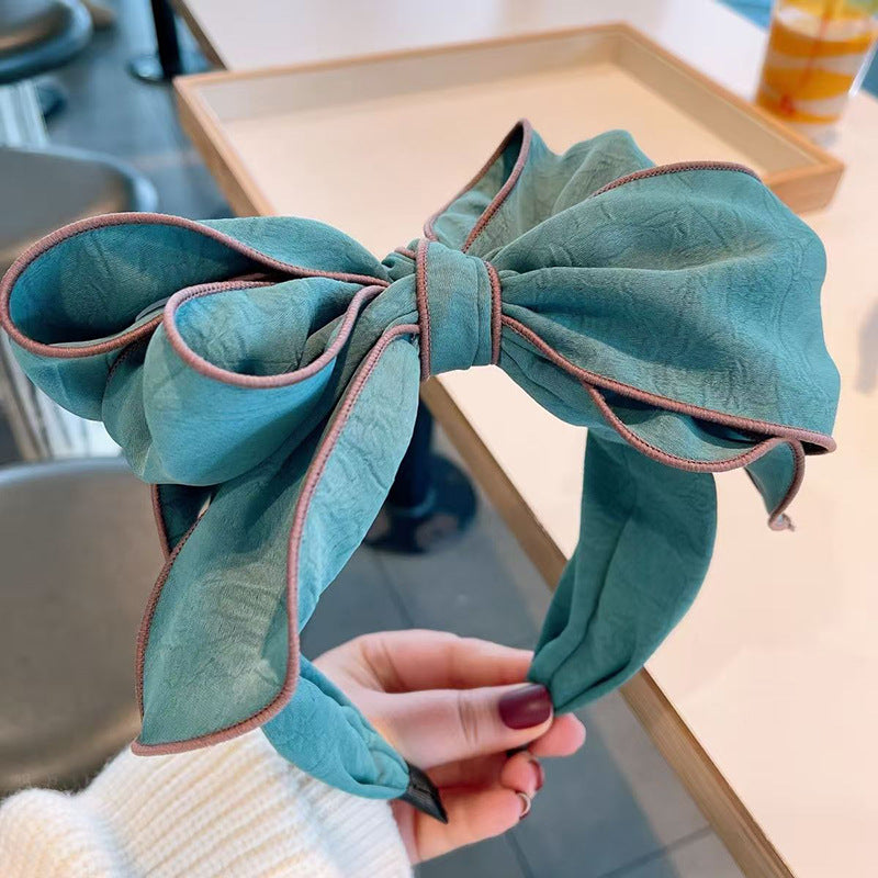 Bandeau large bordé avec un arc 3D pour les femmes