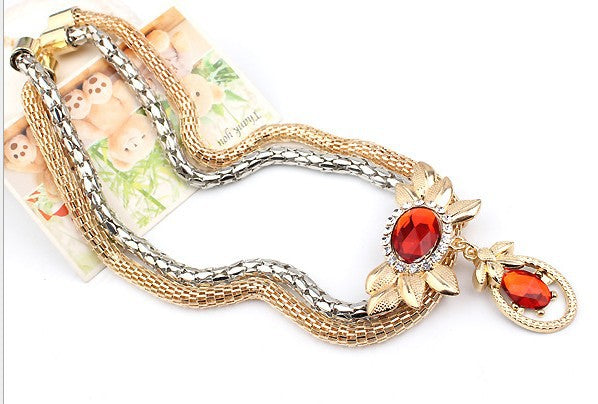 Alliage de mariée quatre pièces d'Europe et d'Amérique double couleur collier de fleur de cristal oreille