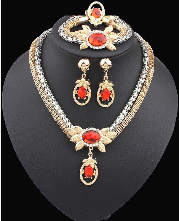 Alliage de mariée quatre pièces d'Europe et d'Amérique double couleur collier de fleur de cristal oreille