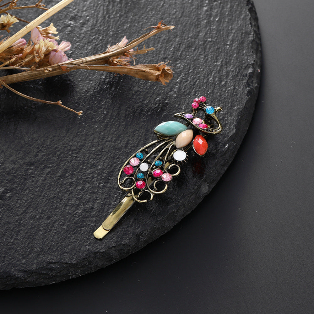 Clip à cheveux vintage en strass couleur paon