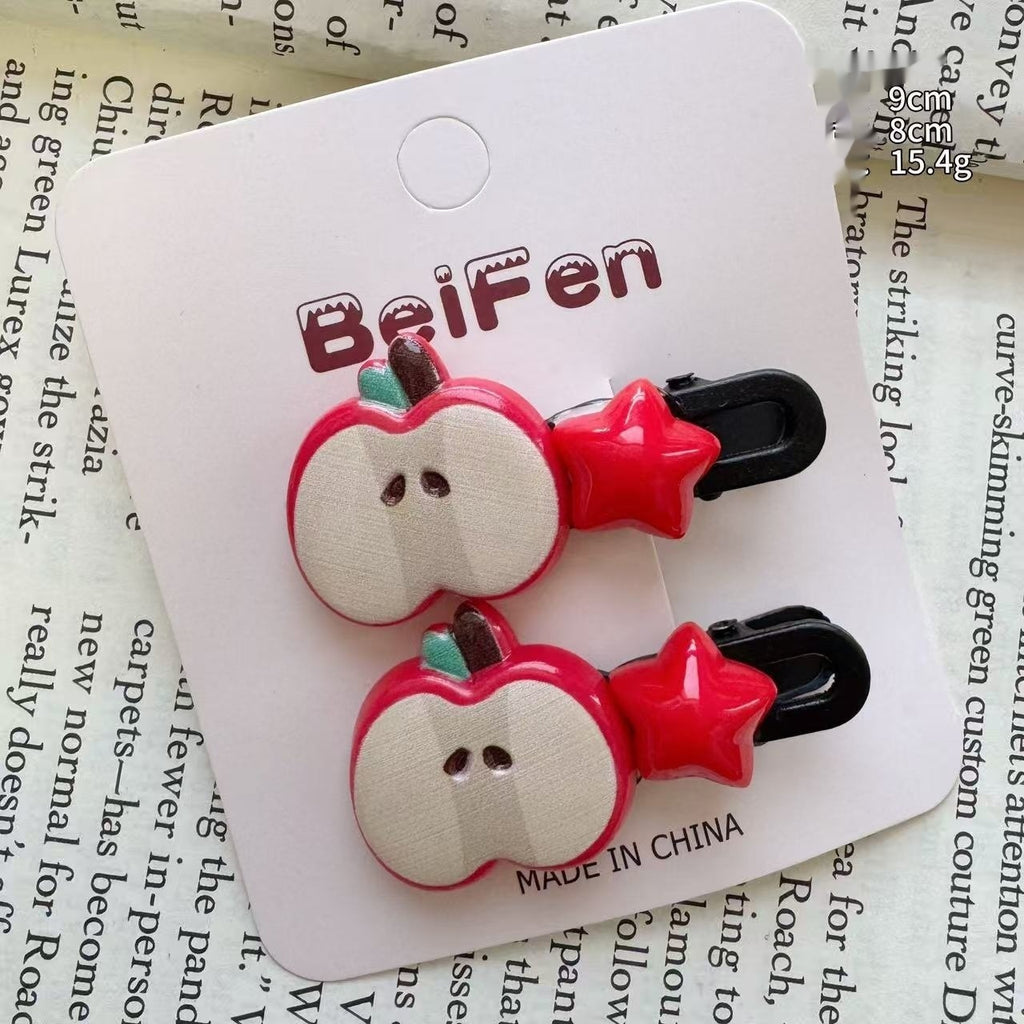 Cartoon créatif Apple et accessoires de coiffure Star avec thèmes de Noël et année