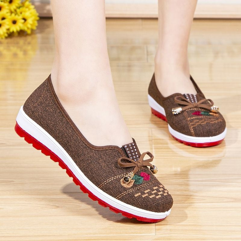 Chaussures en tissu brodé antidérapant avec une semelle souple