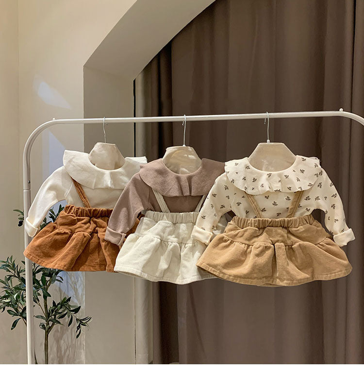 Haut élégant de la couche de base avec un collier tournant et manches longues