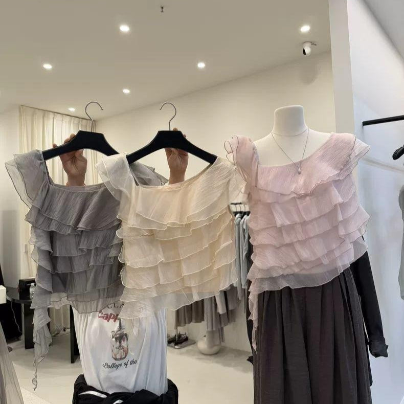 Top multi-couches de style coréen avec un collier incliné