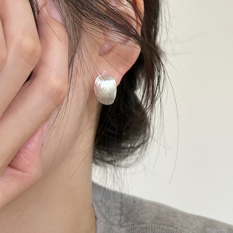 Boucles d'oreilles irrégulières et irrégulières