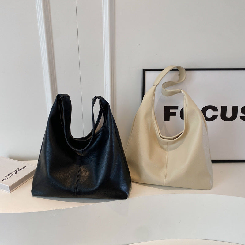 Tote coréen élégant polyvalent et occasionnel avec une grande capacitéparfait comme un sac sous-arm