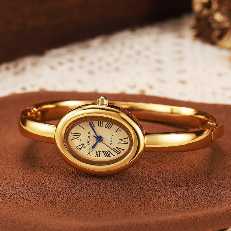 Montre femme ovale Niche légère-luxe avec une lunette diamant or rose