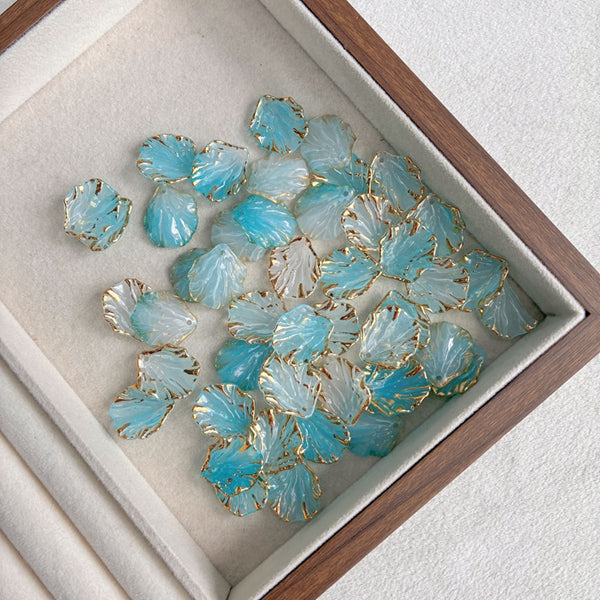 Perles de feuille de coquillage en or gradué