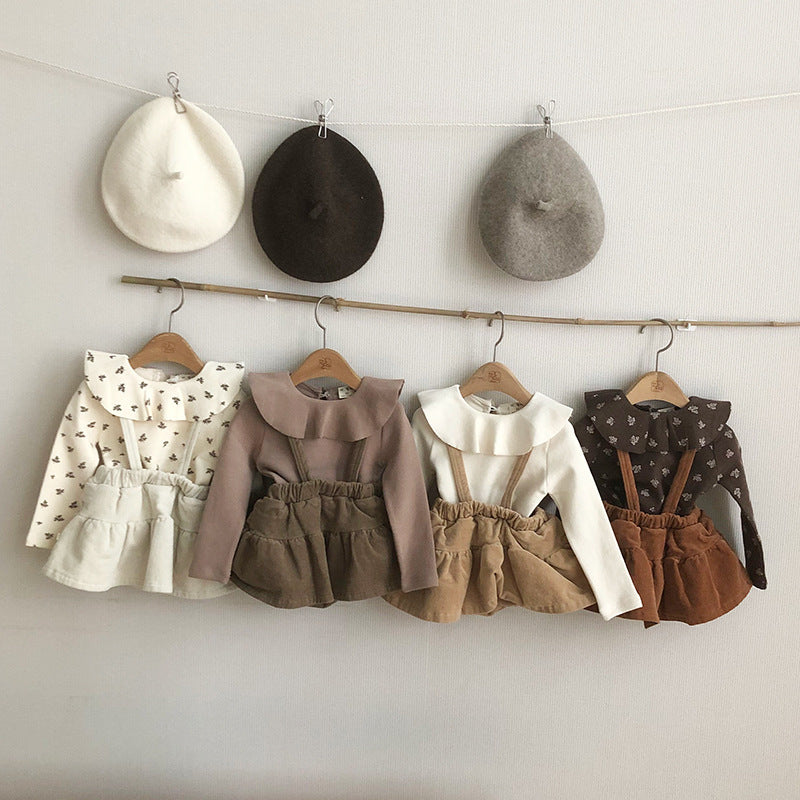 Haut élégant de la couche de base avec un collier tournant et manches longues