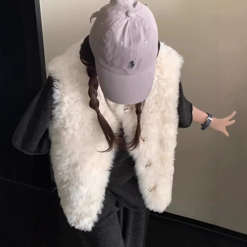 Veste en cuir et en fourrure mi-longueur