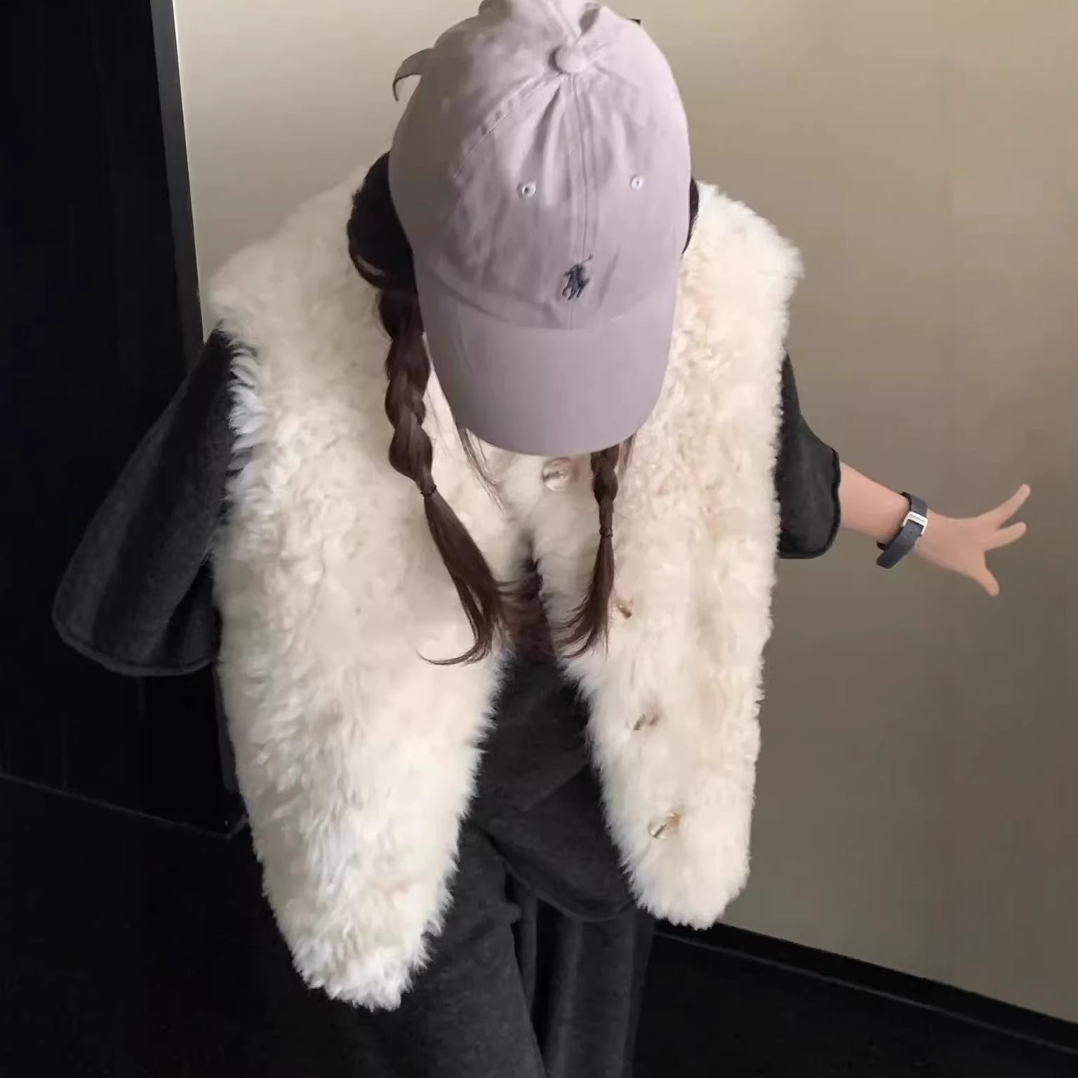 Veste en cuir et en fourrure mi-longueur