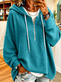 Sweatshirt à capuchon avec design décontracté et décontracté doté d'une fermeture zippée